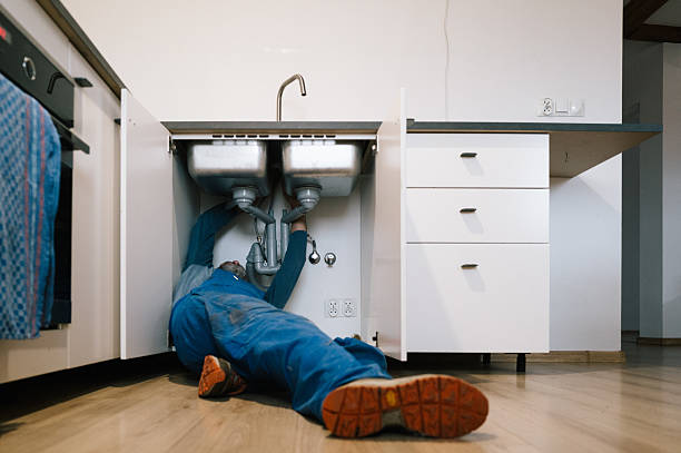 Professional Drain Cleaning technician working in Wheatland, WY